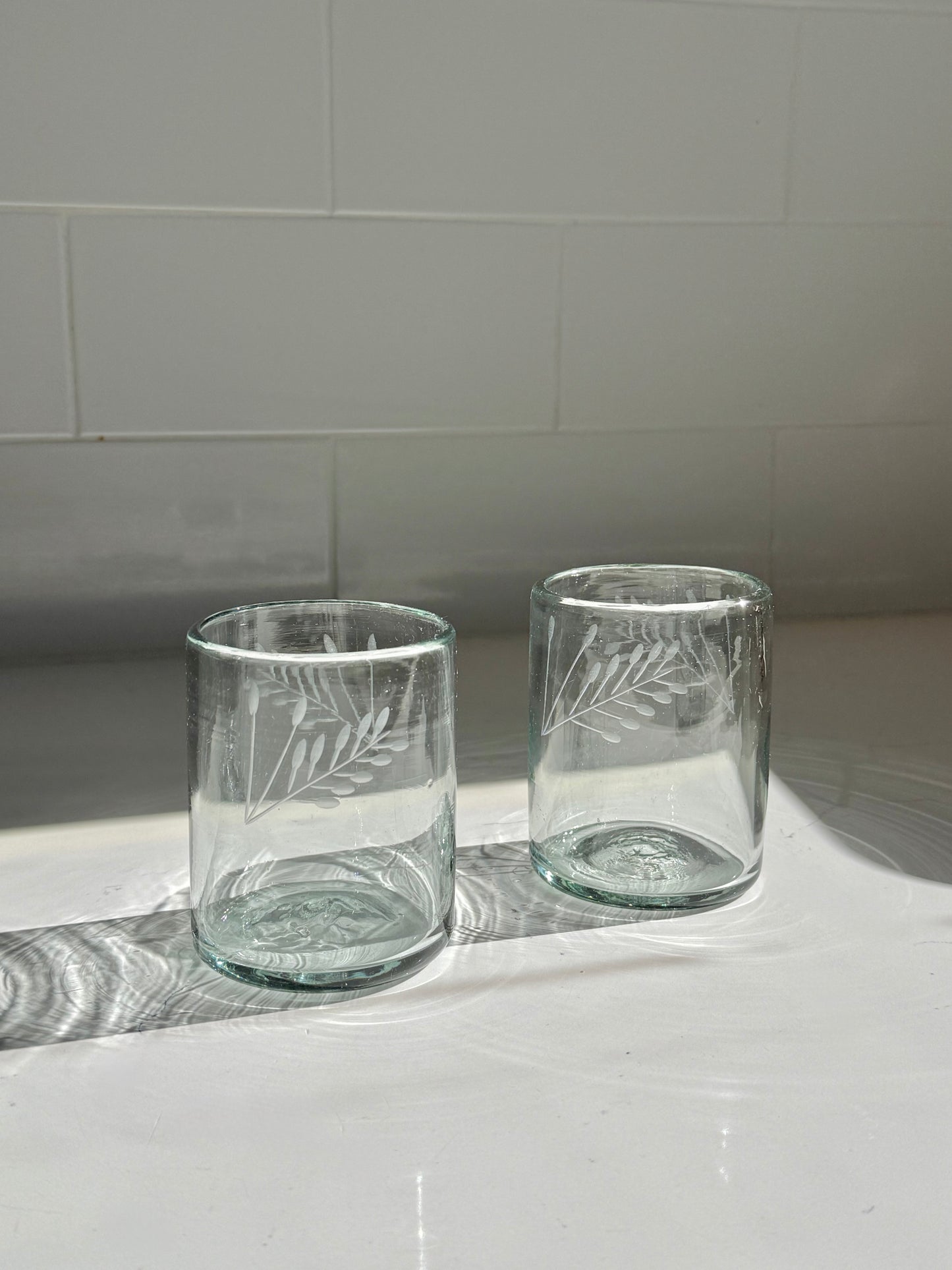 Floral etched Tumbler Glass